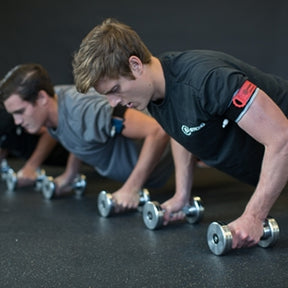 Men doing Pushups with B Strong BFR Arm Bands